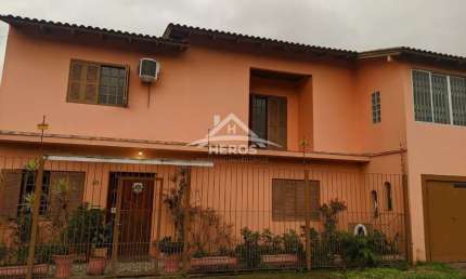 Casa com 4 quartos à venda na Beco Maria Alice, 40, Restinga, Porto Alegre por R$ 477.000
