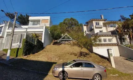 Terreno em condomínio fechado à venda na Rua Alcebíades Antônio dos Santos, 94, Nonoai, Porto Alegre por R$ 390.000