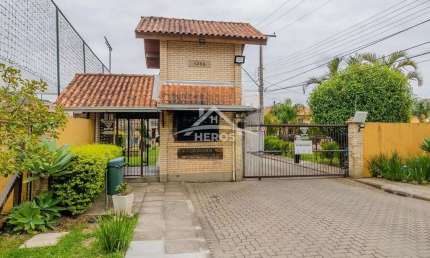 Casa em condomínio fechado com 2 quartos à venda na Avenida Edgar Pires de Castro, 1286, Hípica, Porto Alegre por R$ 380.000