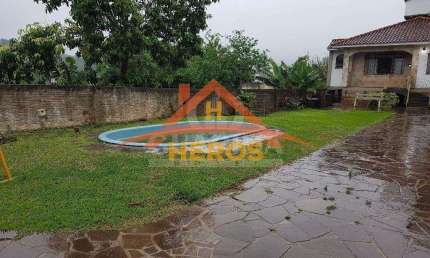 Casa com 3 quartos à venda na Rua Marquês do Maricá, 168, Vila Nova, Porto Alegre por R$ 599.900