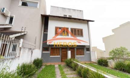 Casa em condomínio fechado com 3 quartos à venda na Rua Henrique Anawate, 480, Guarujá, Porto Alegre por R$ 560.000