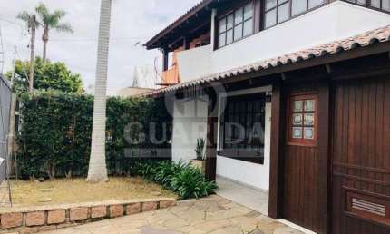 Casa com 3 quartos à venda na Rua Mampituba, 246, Ipanema, Porto Alegre por R$ 638.000