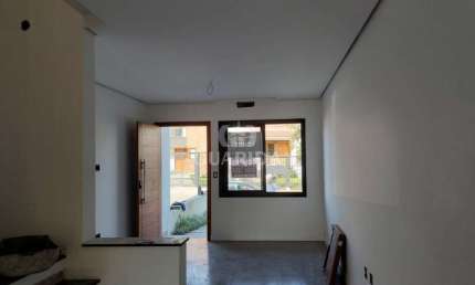 Casa com 2 quartos à venda na Rua Canísio Binsfeld, 282, Hípica, Porto Alegre por R$ 445.000