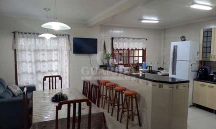 Casa em condomínio fechado com 3 quartos à venda na Estrada Cristiano Kraemer, 3341, Vila Nova, Porto Alegre por R$ 318.000