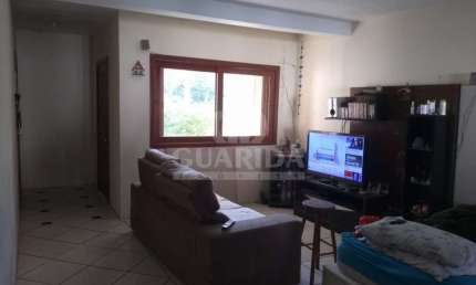 Casa em condomínio fechado com 3 quartos à venda na Rua Amapá, 786, Vila Nova, Porto Alegre por R$ 297.000