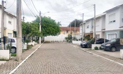 Casa em condomínio fechado com 3 quartos à venda na Avenida Edgar Pires de Castro, 2520, Hípica, Porto Alegre por R$ 349.000