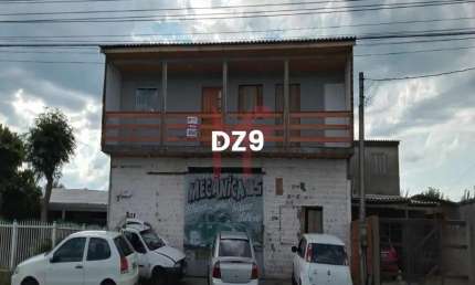 SOBRADO COM 02 APTOS NA PARTE SUPERIOR + PONTO COMERCIAL SENDO UMA OFICINA