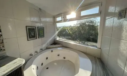 Casa em condomínio fechado com 3 quartos para alugar na Rua Tocantins, 937, Lomba do Pinheiro, Porto Alegre, 291 m2 por R$ 7.500
