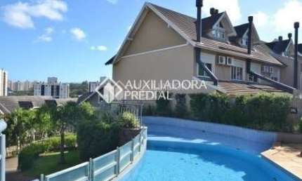Casa em condomínio fechado com 5 quartos para alugar na Rua Attílio Bilibio, 120, Jardim Carvalho, Porto Alegre, 375 m2 por R$ 15.000