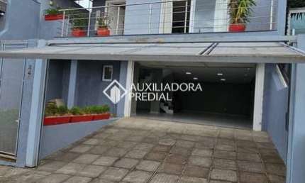 Casa em condomínio fechado com 4 quartos para alugar na Rua Walter Porto Filho, 240, Mário Quintana, Porto Alegre, 284 m2 por R$ 6.300