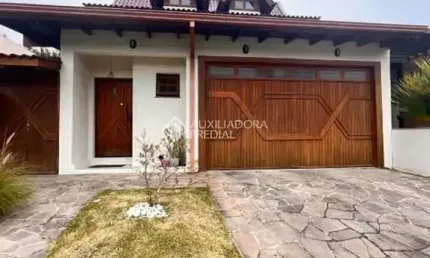 Casa em condomínio fechado com 3 quartos para alugar na avenida juca batista, 8000, cavalhada, porto alegre, 332 m2 por r$ 7.900