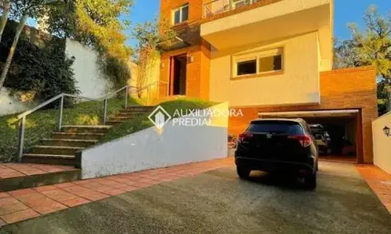 Casa em condomínio fechado com 4 quartos para alugar na rua rádio e travessa gaúcha, 59, santa tereza, porto alegre, 339 m2 por r$ 11.000