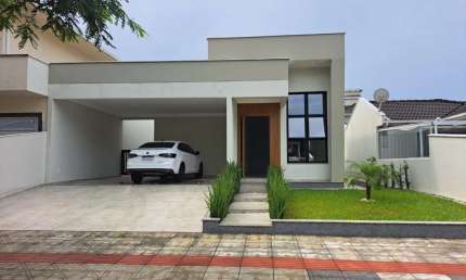 Casa em condomínio fechado com 3 quartos à venda na Rua Monte Cambirela, 455, Praia de Fora, Palhoça, 137 m2 por R$ 990.000