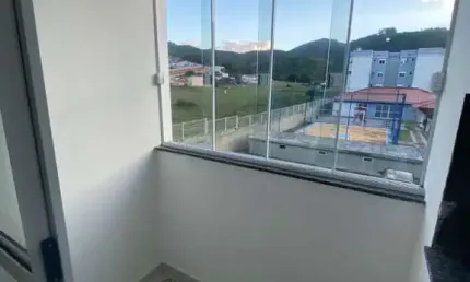 Apartamento com 2 quartos à venda na Rua Homero de Miranda Gomes, 1197, Fundos, Biguaçu, 51 m2 por R$ 245.000