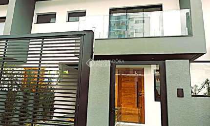 Casa com 3 quartos à venda na Rua Verona, 2, Pagani, Palhoça, 121 m2 por R$ 830.000