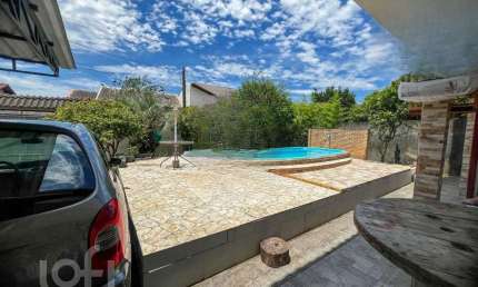 Casa com 4 quartos à venda na Servidão Alcidomiro Flores, 198, Rio Tavares, Florianópolis, 144 m2 por R$ 2.544.000