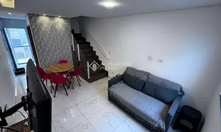 Casa em condomínio fechado com 2 quartos à venda na Rua Santa Bárbara, 392, Vila Caiçara, Praia Grande, 58 m2 por R$ 350.000