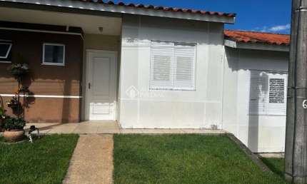 Casa em condomínio fechado com 2 quartos à venda na Rua Lino Estácio dos Santos, 1535, Oriço, Gravataí, 55 m2 por R$ 170.000