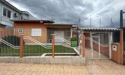 Casa com 3 quartos à venda na Avenida João Marciano, 105, Girassol, Gravataí, 130 m2 por R$ 585.000
