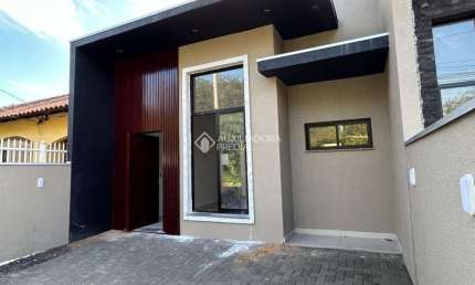 Casa com 3 quartos à venda na Rua Izalino Batista de Oliveira, 140, Oriço, Gravataí, 93 m2 por R$ 609.000