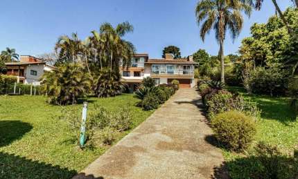 Casa em condomínio fechado com 4 quartos à venda na Rua da Amizade, 76, Barro Vermelho, Gravataí, 450 m2 por R$ 2.500.000