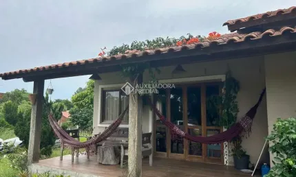 Casa em condomínio fechado com 3 quartos à venda na Avenida Ely Corrêa, 9240, Residence Park, Gravataí, 135 m2 por R$ 636.000