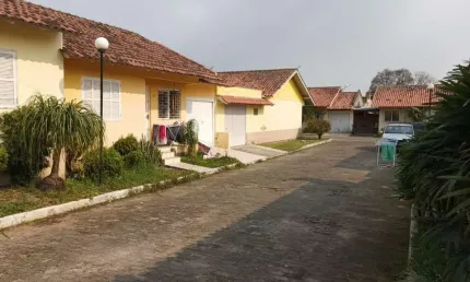 Casa em condomínio fechado com 2 quartos à venda na Rua dos Tupis, 320, Barnabé, Gravataí, 94 m2 por R$ 290.000