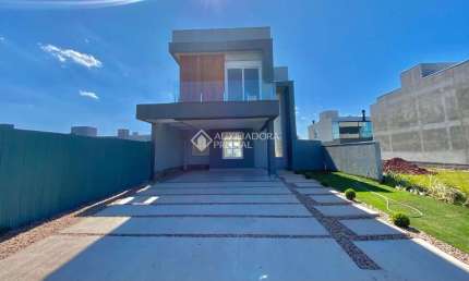 Casa em condomínio fechado com 3 quartos à venda na Rua Paraná, 120, São Vicente, Gravataí, 170 m2 por R$ 1.346.000