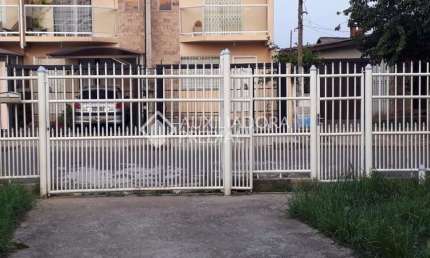 Casa em condomínio fechado com 4 quartos à venda na Rua Doutor Décio Martins Costa, 915, Vila Eunice Nova, Cachoeirinha, 184 m2 por R$ 477.000