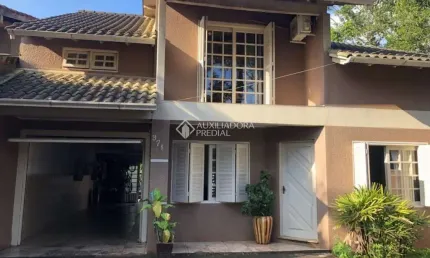 Casa com 3 quartos à venda na Travessa Marino, 971, Neópolis, Gravataí, 220 m2 por R$ 670.000