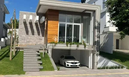 Casa com 3 quartos à venda na Urânio, 408, São Vicente, Gravataí, 220 m2 por R$ 2.190.000