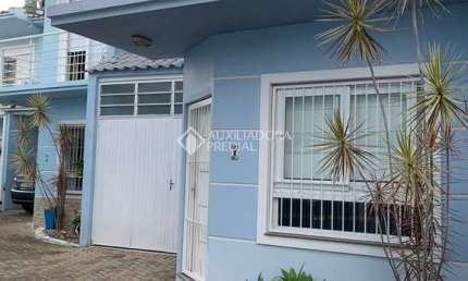 Casa em condomínio fechado com 3 quartos à venda na Tancredo Neves, 312, Rio Branco, Canoas, 93 m2 por R$ 399.000