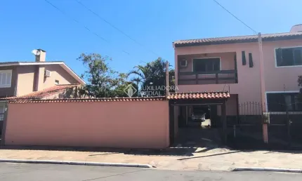 Casa com 3 quartos à venda na Rua Waldemar Guido Vicentini, 326, Dom Feliciano, Gravataí, 266 m2 por R$ 1.325.000