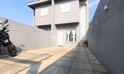 Casa com 2 quartos à venda na Rua Adams Filho, 141, Parque Ipiranga, Gravataí, 65 m2 por R$ 450.000