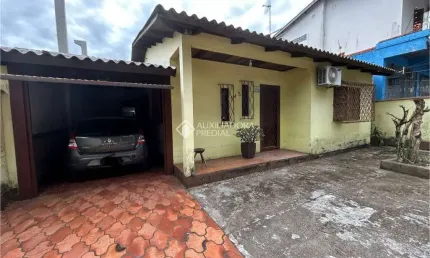 Casa com 2 quartos à venda na Paissandu, 145, Parque dos Eucalíptos, Gravataí, 100 m2 por R$ 297.000