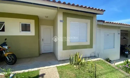 Casa em condomínio fechado com 2 quartos à venda na Rua Lino Estácio dos Santos, 1535, Oriço, Gravataí, 60 m2 por R$ 220.000