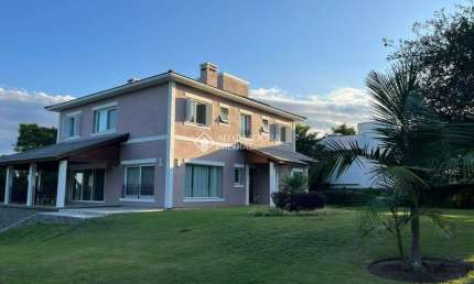 Casa em condomínio fechado com 5 quartos à venda na Rua da Amizade, 1057, Barro Vermelho, Gravataí, 521 m2 por R$ 3.950.000