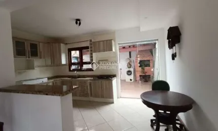 Casa com 2 quartos à venda na Eurico Gomes de Oliveira, 153, Loteamento Jardim Timbaúva, Gravataí, 70 m2 por R$ 320.000