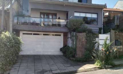 Casa com 4 quartos para alugar na Rua João Carlos Linck, 140, Loteamento Jardim Timbaúva, Gravataí, 236 m2 por R$ 4.950