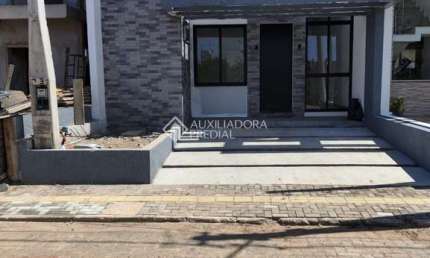 Casa em condomínio fechado com 3 quartos à venda na Rua das Camélias, 329, Parque da Matriz, Gravataí, 90 m2 por R$ 700.000