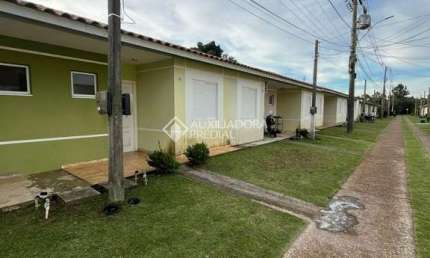 Casa em condomínio fechado com 2 quartos à venda na Rua Lino Estácio dos Santos, 1535, Oriço, Gravataí, 44 m2 por R$ 205.000