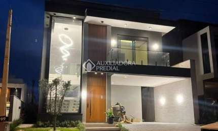 Casa em condomínio fechado com 3 quartos à venda na Rua Adolfo Inácio de Barcelos, 1490, Centro, Gravataí, 270 m2 por R$ 2.450.000