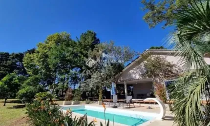 Casa em condomínio fechado com 3 quartos à venda na Avenida Ely Corrêa, 9240, Vila Imperial, Gravataí, 300 m2 por R$ 1.090.000