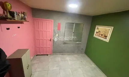 Casa em condomínio fechado com 2 quartos à venda na Rua Jorge Amado, 981, São Vicente, Gravataí, 57 m2 por R$ 172.000