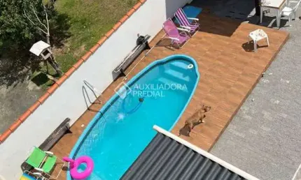 Casa com 3 quartos à venda na Henrique Nicolau Peixer, 95, Enseada de Brito, Palhoça, 200 m2 por R$ 1.190.000