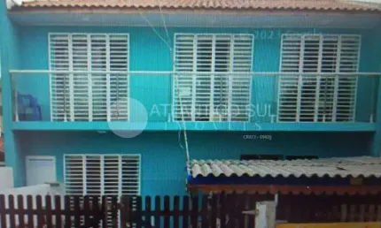Sobrado na praia 25m do mar com 2 quartos, 3 banheiros, piscina e churrasqueira