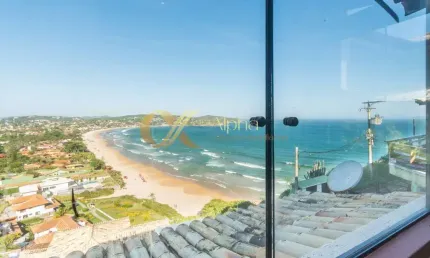 Casa à venda com 4 quartos (3 suítes) com vista ao mar cinematográfica