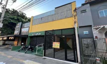 Sala casa comercial para locação na Barra frente de rua grande com 3 garagens