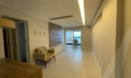 Apartamento quarto e sala vista mar semi mobiliado com 1 vaga de garagem com infraestrutura completa em Armação no Salvador Suítes