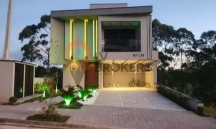 Luxuosa casa em condomínio à venda em Mogi das Cruzes, no bairro Aruã, com 3 quartos, 3 suítes, 2 salas, 5 banheiros, 4 vagas e 332m².